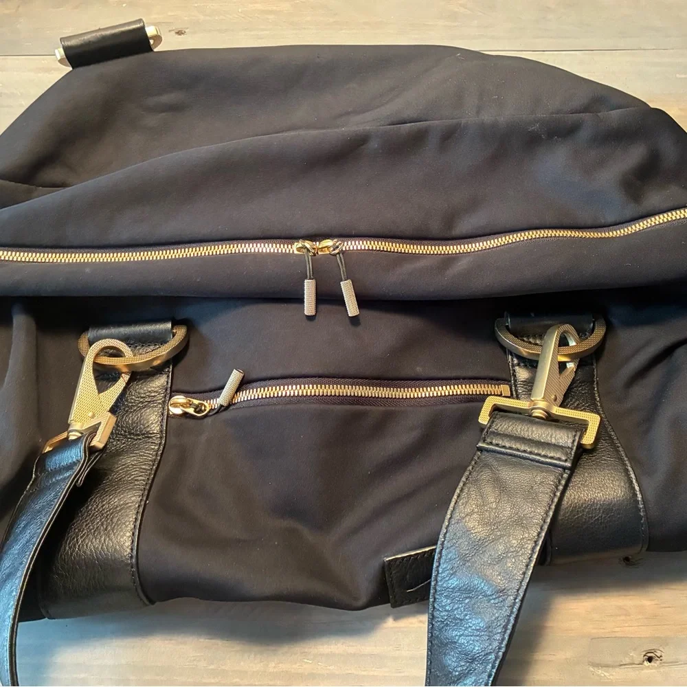 Black Men's Bag with Gold Accents